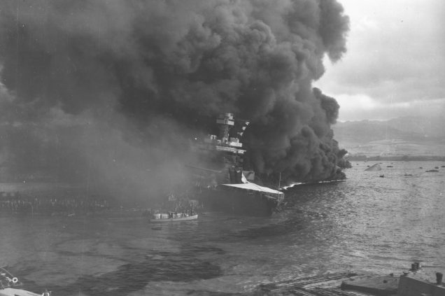 Smoke billows from the USS California after the Japanese attack on Pearl Harbor, Hawaii, Dec. 7, 1941. The crew was quickly ordered to abandon ship. (National Archives)