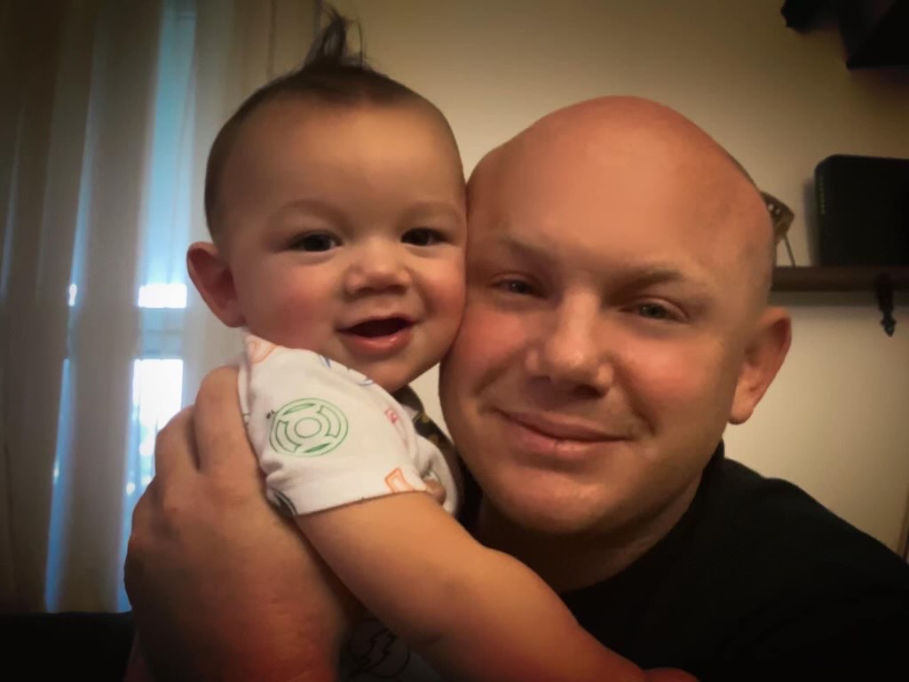 staff sergeant steven smiley with baby son