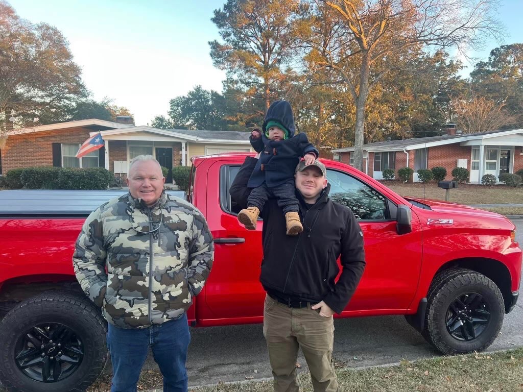 staff sergeant steven smiley with father and son